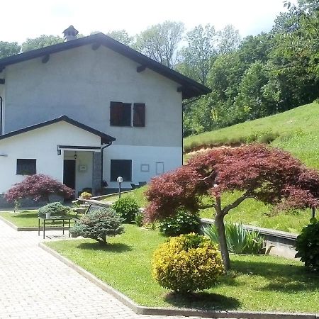Rueglio Appartamento La Casa Nel Bosco מראה חיצוני תמונה